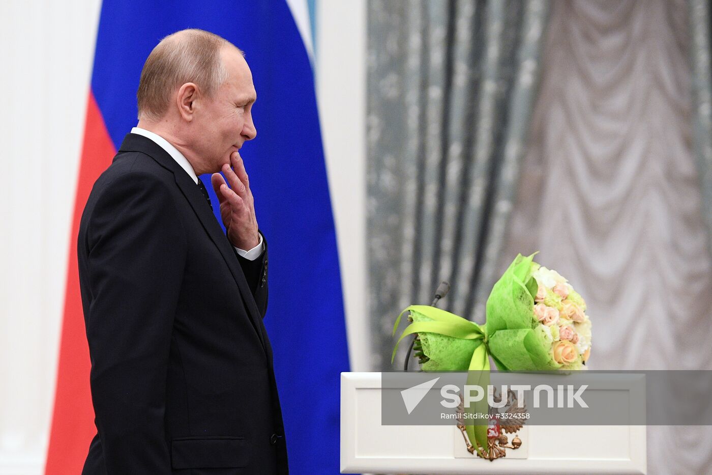 Russian President Vladimir Putin meets with Russian athletes - winners and medalists of 12th Paralympic Winter Games