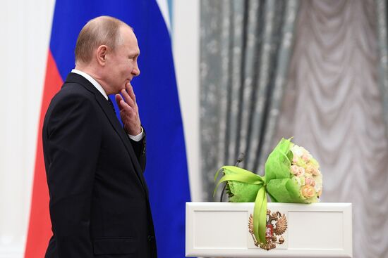 Russian President Vladimir Putin meets with Russian athletes - winners and medalists of 12th Paralympic Winter Games