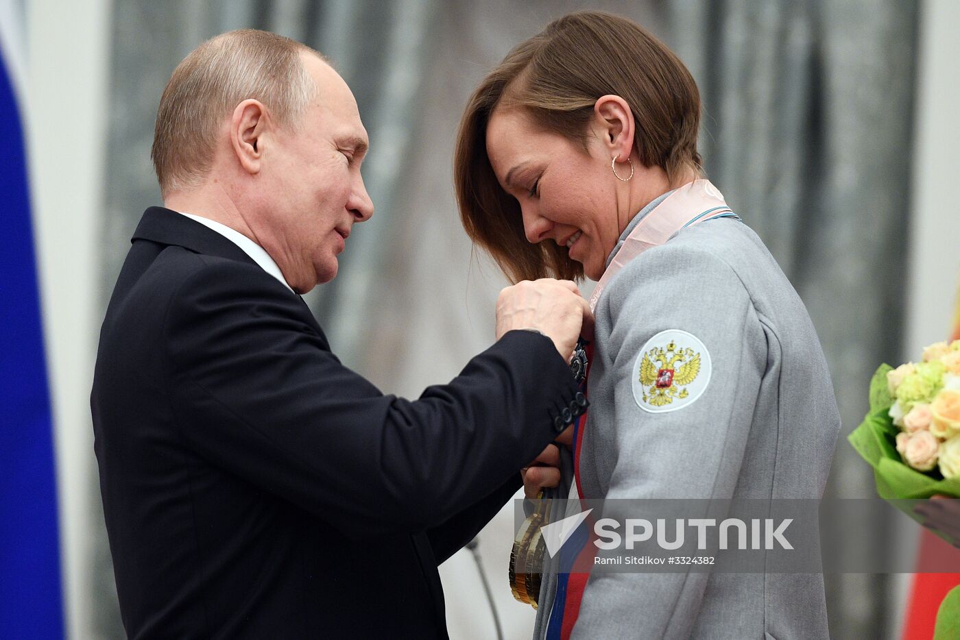 Russian President Vladimir Putin meets with Russian athletes - winners and medalists of 12th Paralympic Winter Games