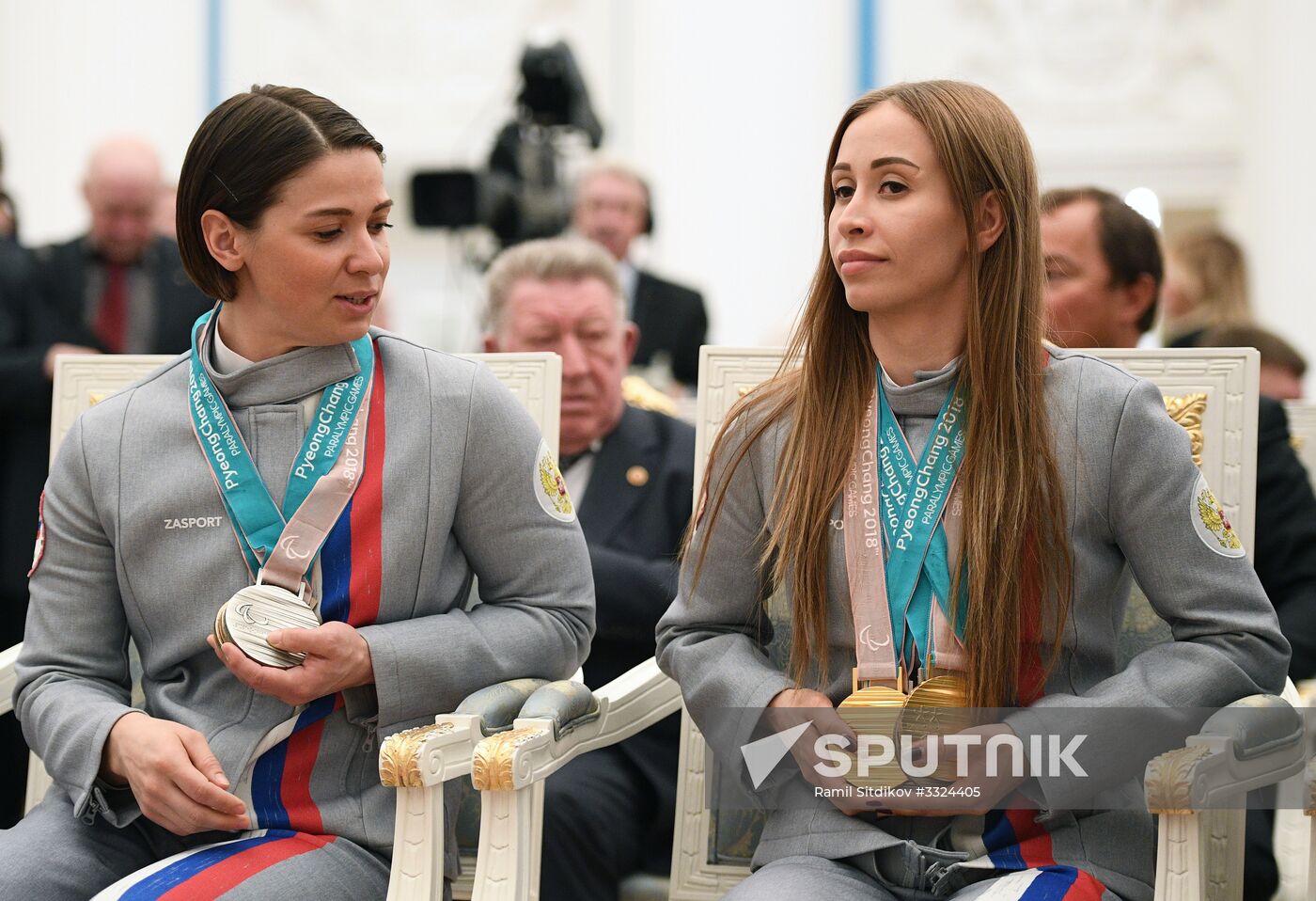 Russian President Vladimir Putin meets with Russian athletes - winners and medalists of 12th Paralympic Winter Games