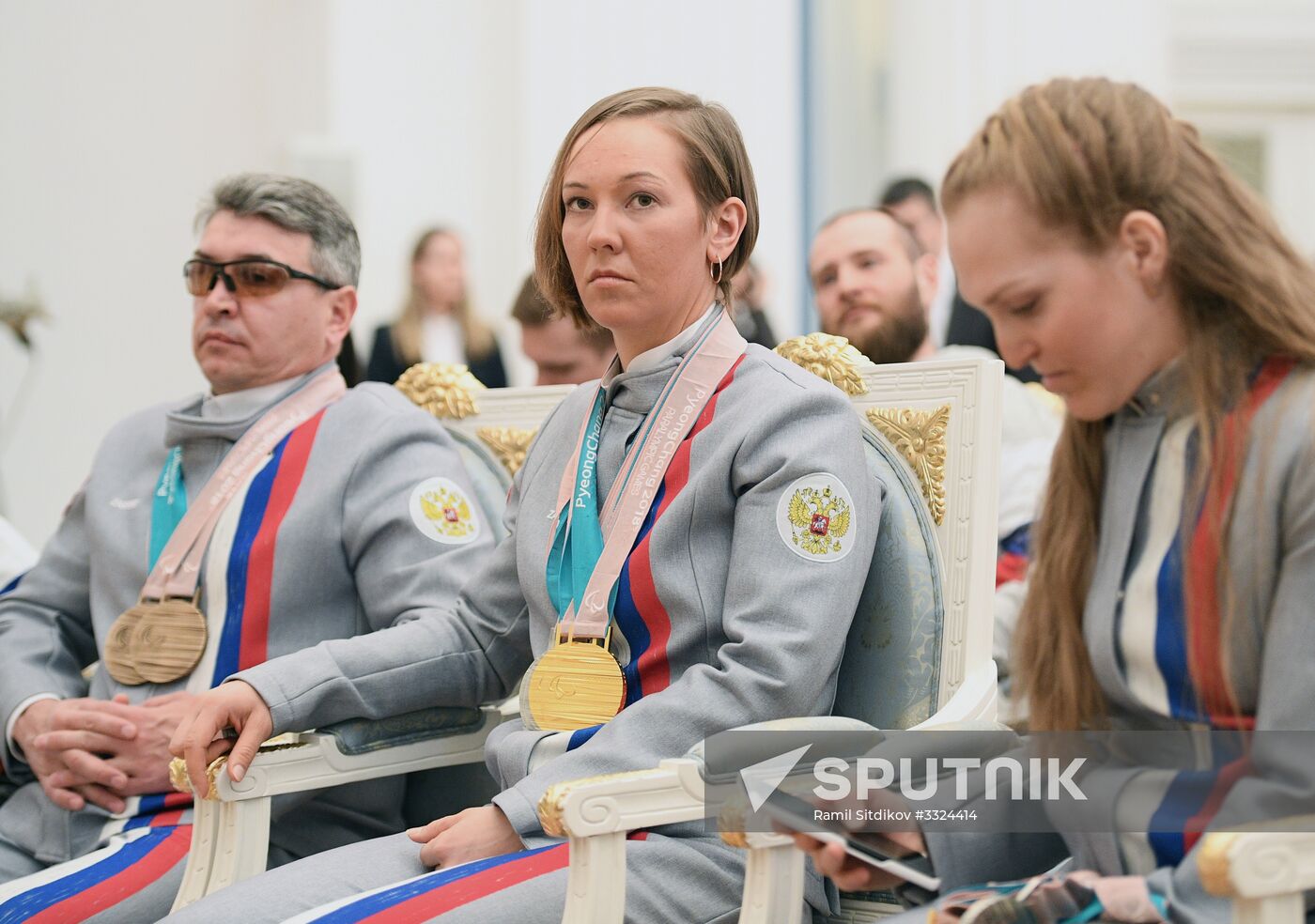 Russian President Vladimir Putin meets with Russian athletes - winners and medalists of 12th Paralympic Winter Games