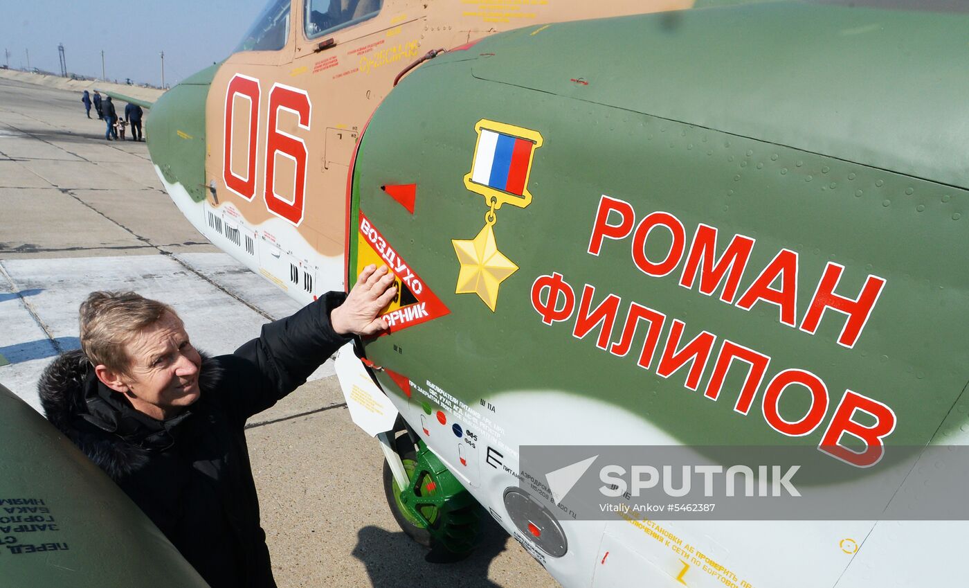 Hero of Russia Roman Filipov's father Nikolai Filipov is seen here at the Sukhoi Su-25SM jet named after Hero of Russia Roman Filipov at the Chernogovka airfield of the Air Force regiment at the Eastern Military District. Military pilot Roman Filipov served in the regiment for ten years, then was sent on special missions to Syria where he died in the line of duty on February3, 2018. Location: Russia, Primorsky krai region. Author: Vitaliy Ankov/Sputnik. Military jet named after Roman Filipov in Primorye Territory
