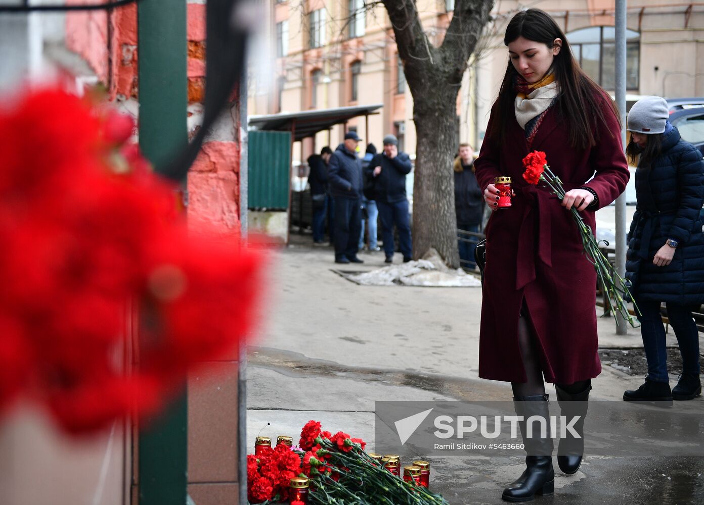 Flowers in memory of Zimnyaya Vishnya shopping mall victims