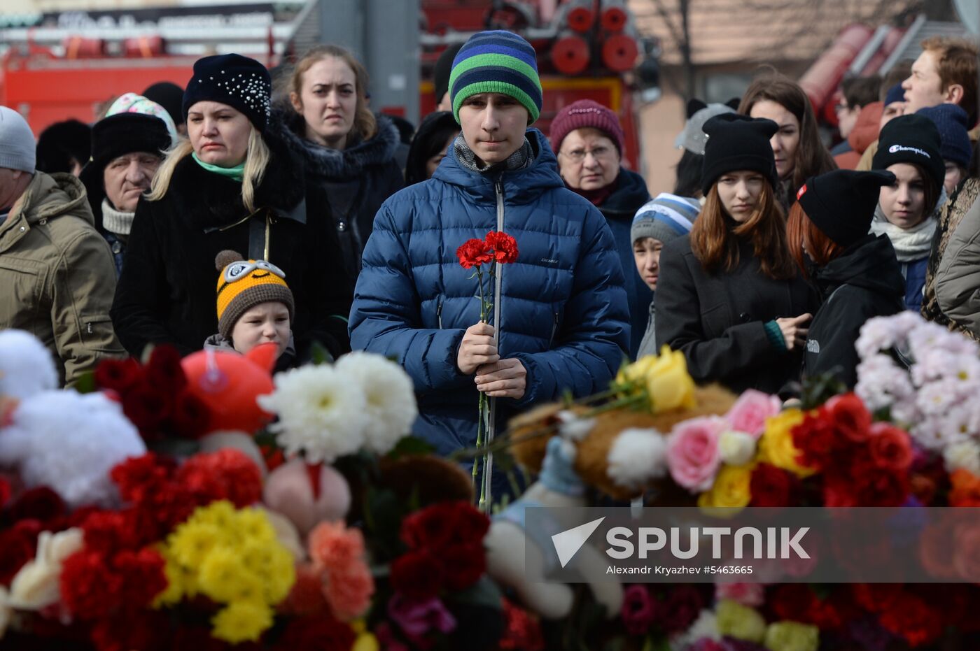 Flowers in memory of Zimnyaya Vishnya shopping mall victims