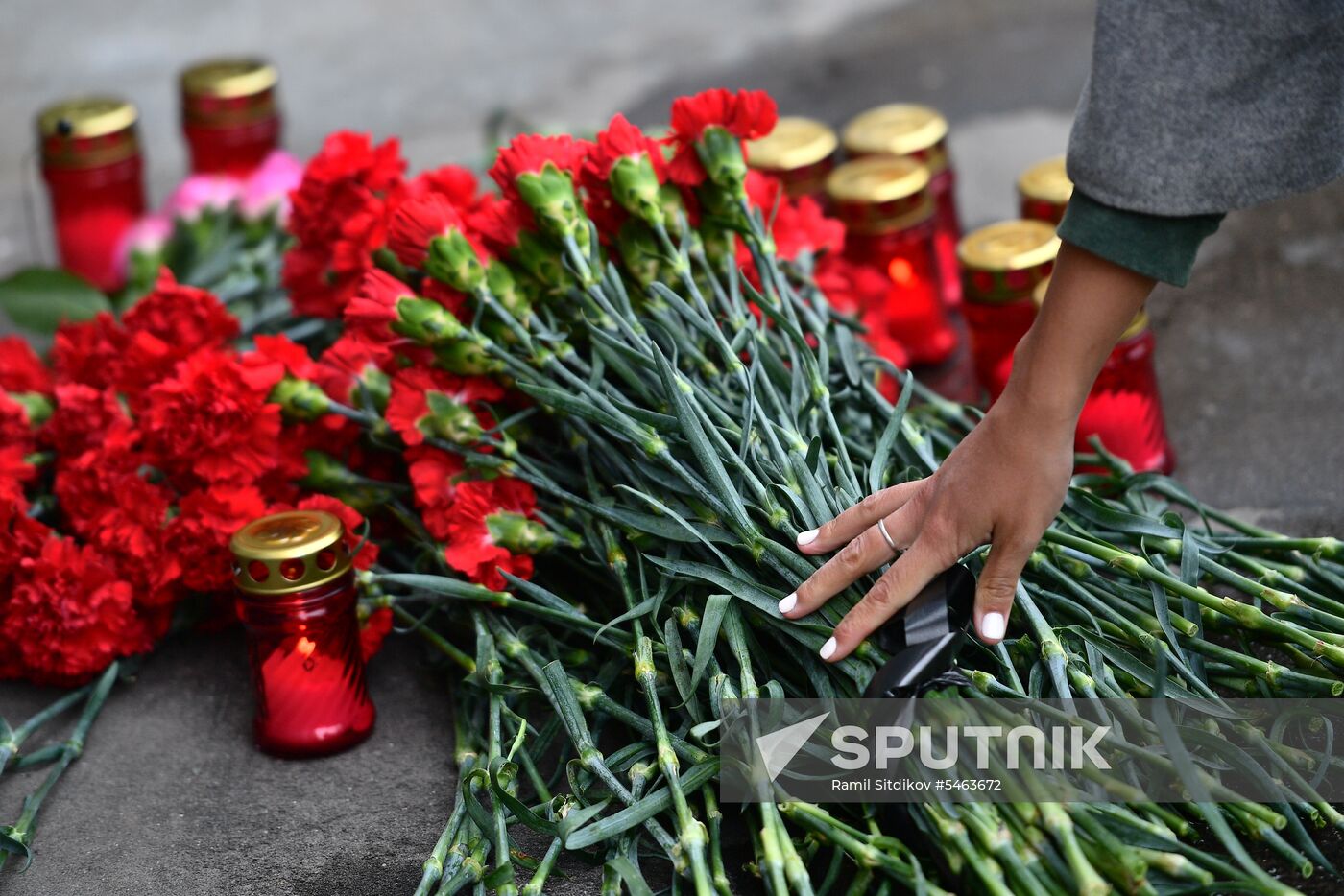 Flowers in memory of Zimnyaya Vishnya shopping mall victims
