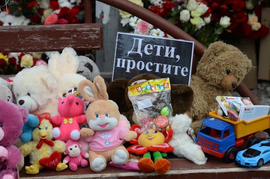 Flowers in memory of Zimnyaya Vishnya shopping mall victims