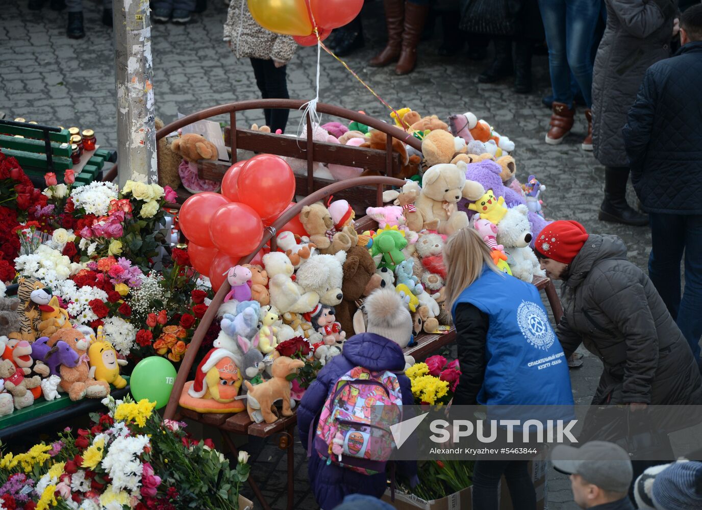Flowers in memory of Zimnyaya Vishnya shopping mall victims