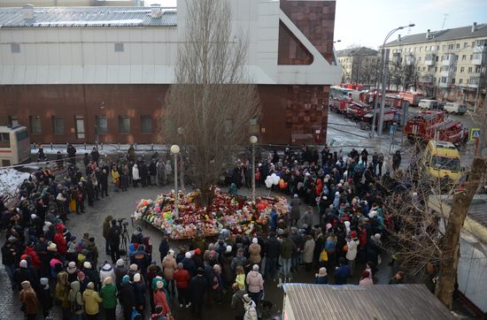 Flowers in memory of Zimnyaya Vishnya shopping mall victims