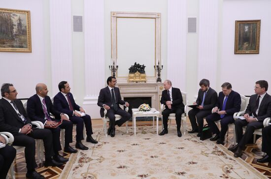 President Vladimir Putin meets with Emir of Qatar Tamim bin Hamad Al Thani