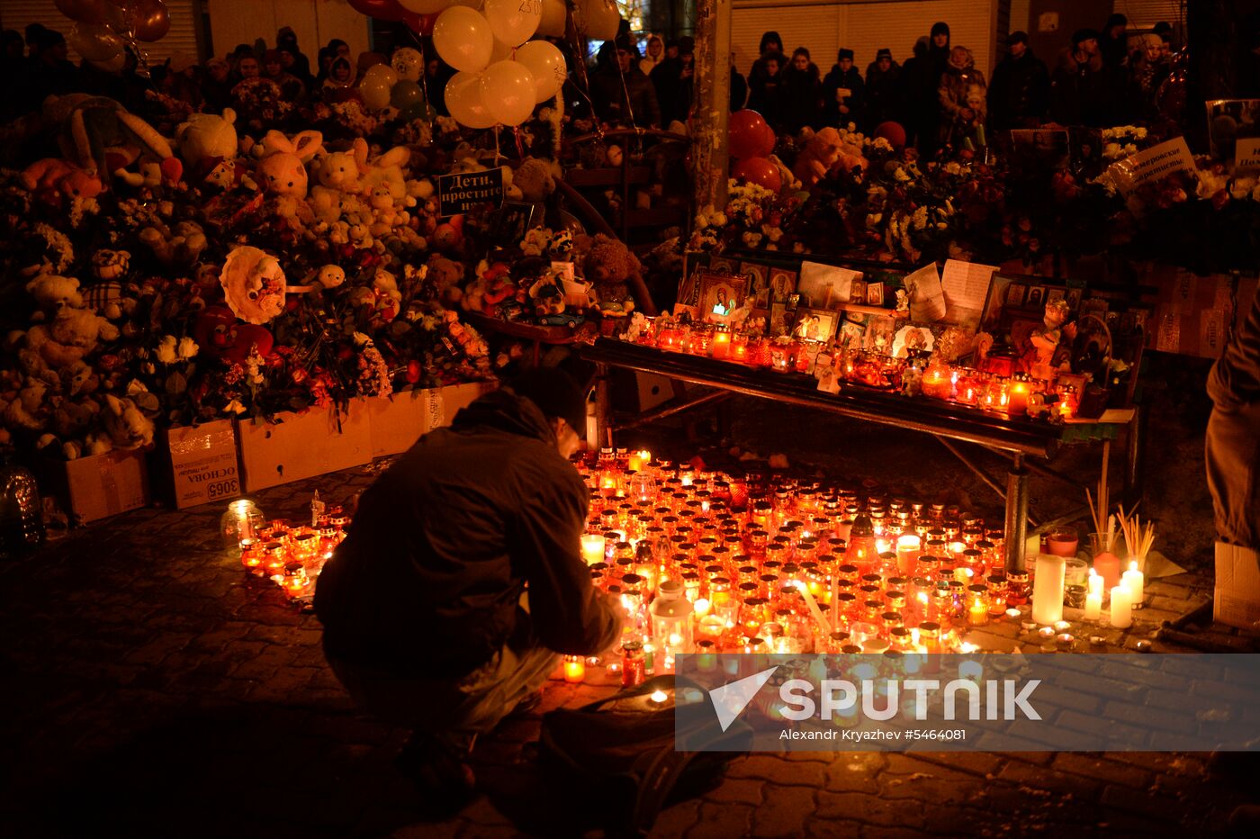 Flowers in memory of Zimnyaya Vishnya shopping mall victims
