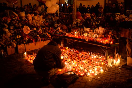Flowers in memory of Zimnyaya Vishnya shopping mall victims
