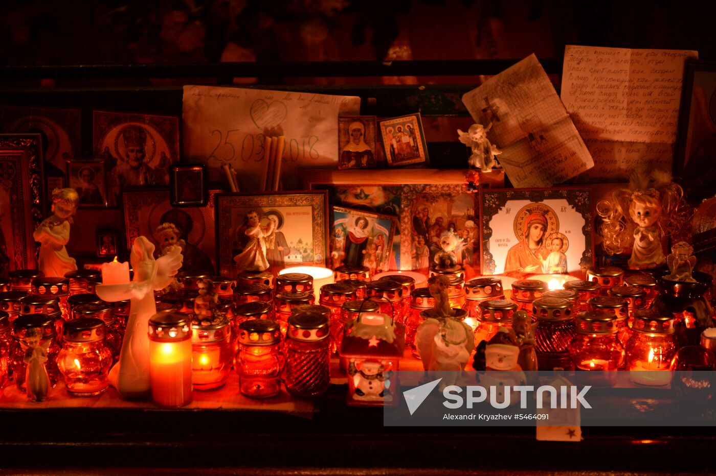 Flowers in memory of Zimnyaya Vishnya shopping mall victims