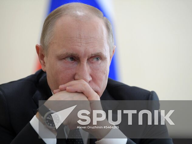 March 27, 2018. Russian President Vladimir Putin during a meeting on relief efforts following the Zimnyaya Vishnya shopping mall fire in Kemerovo. Location: Russia, Kemerovo. Author: Alexei Druzhinin/Sputnik. Russian President Vladimir Putin honors the memory of Kemerovo fire victims