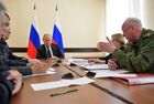 Russian President Vladimir Putin honors the memory of Kemerovo fire victims