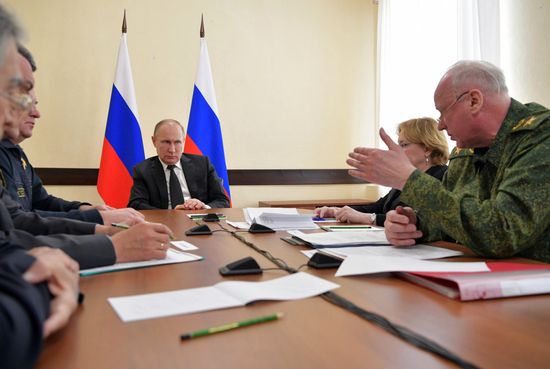 Russian President Vladimir Putin honors the memory of Kemerovo fire victims