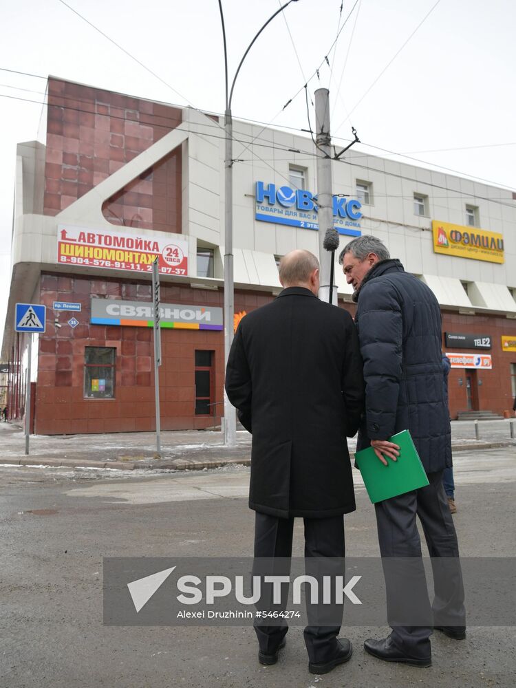 Russian President Vladimir Putin honors the memory of Kemerovo fire victims