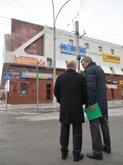 Russian President Vladimir Putin honors the memory of Kemerovo fire victims