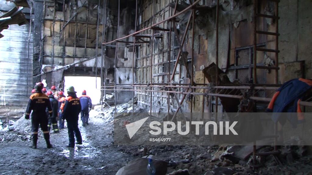 Russia's Investigative Committee's task force at the site of Zimnyaya Vishnya mall fire