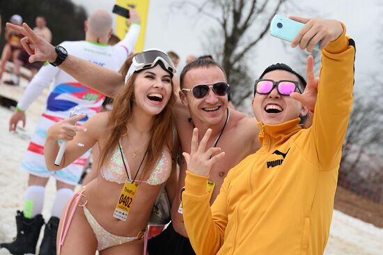 Downhill sliding in bikinis at BoogelWoogel-2018 carnival in Sochi