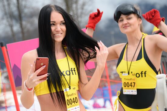 Downhill sliding in bikinis at BoogelWoogel-2018 carnival in Sochi