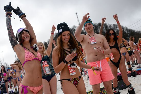 Downhill sliding in bikinis at BoogelWoogel-2018 carnival in Sochi