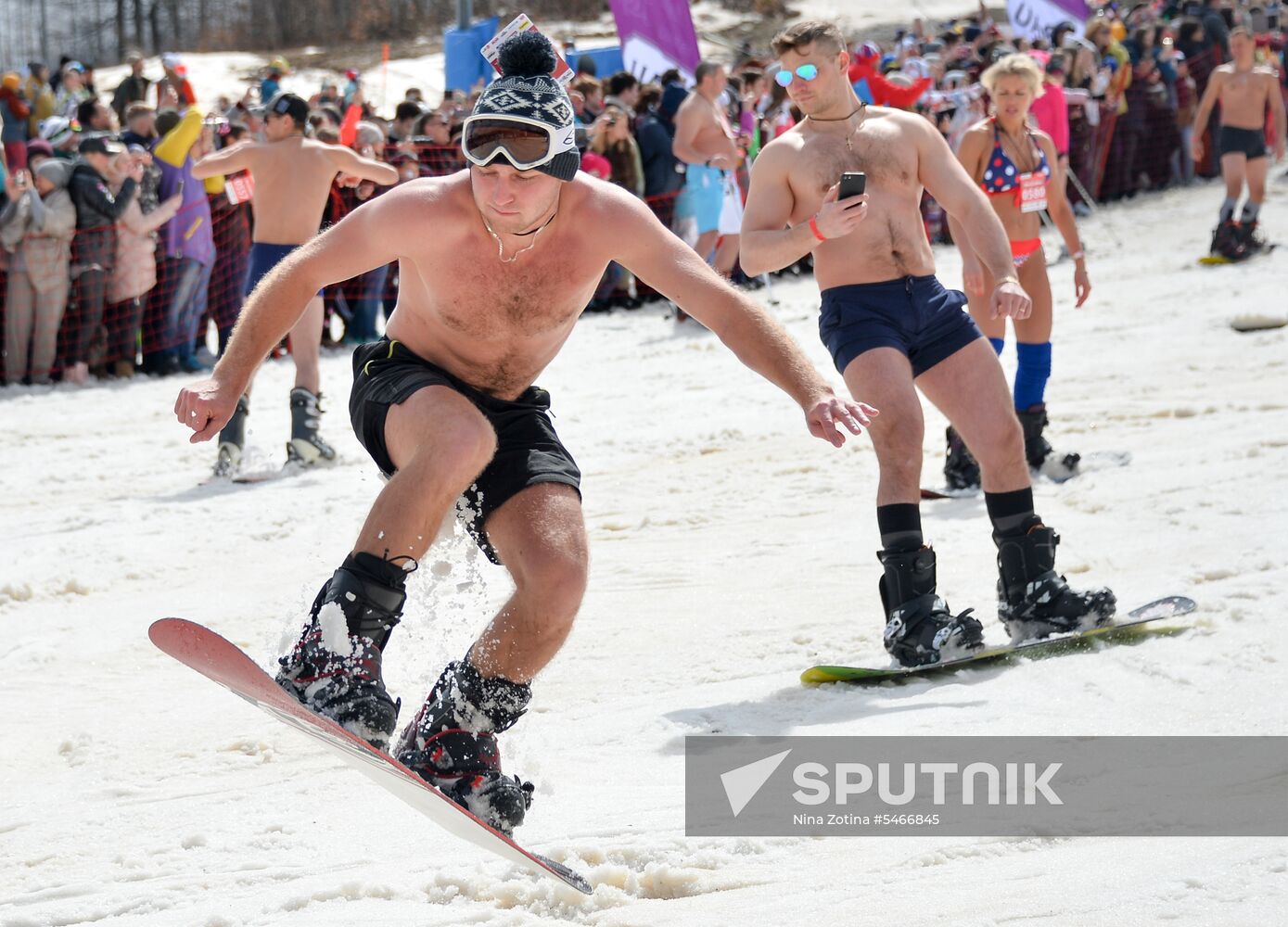 Downhill sliding in bikinis at BoogelWoogel-2018 carnival in Sochi