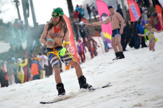 Downhill sliding in bikinis at BoogelWoogel-2018 carnival in Sochi