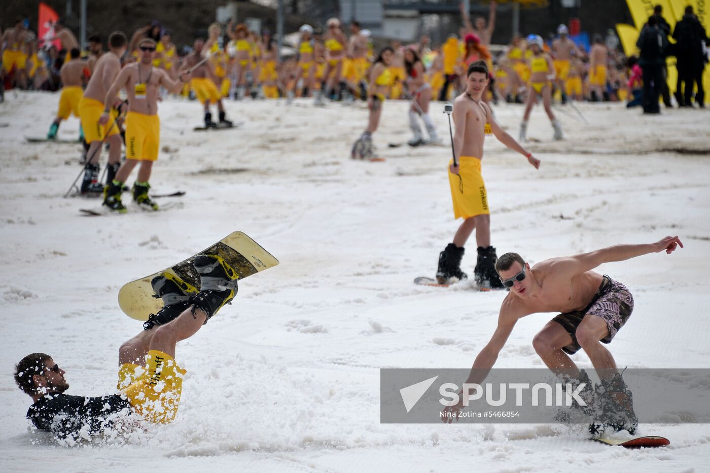 Downhill sliding in bikinis at BoogelWoogel-2018 carnival in Sochi