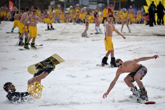 Downhill sliding in bikinis at BoogelWoogel-2018 carnival in Sochi