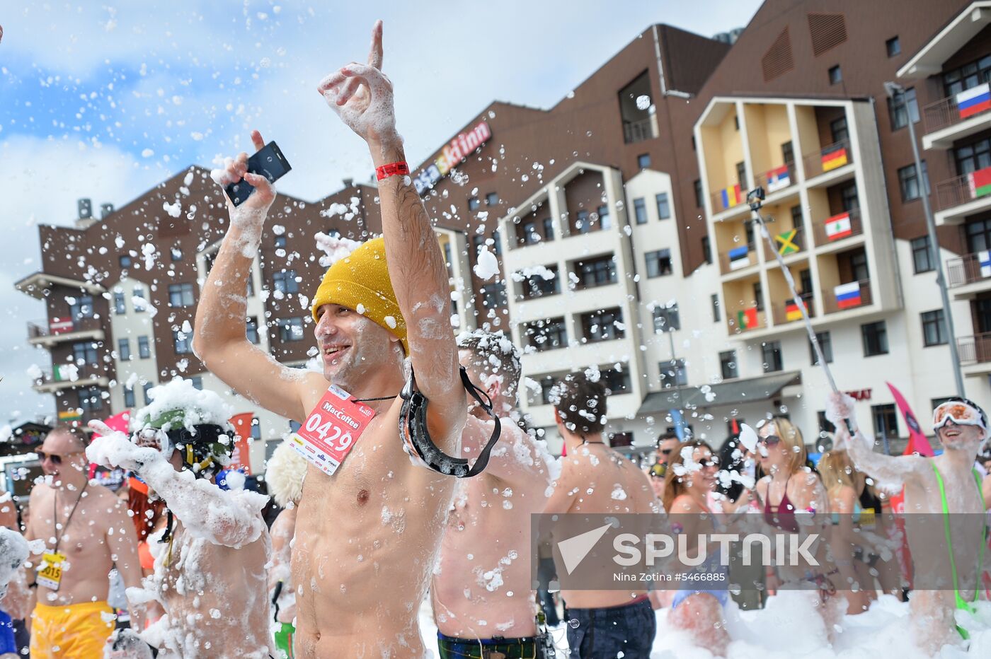 Downhill sliding in bikinis at BoogelWoogel-2018 carnival in Sochi