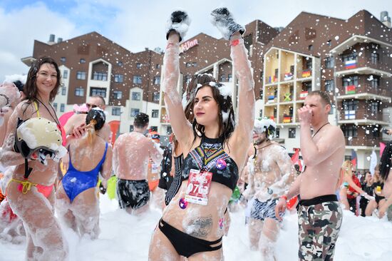 Downhill sliding in bikinis at BoogelWoogel-2018 carnival in Sochi