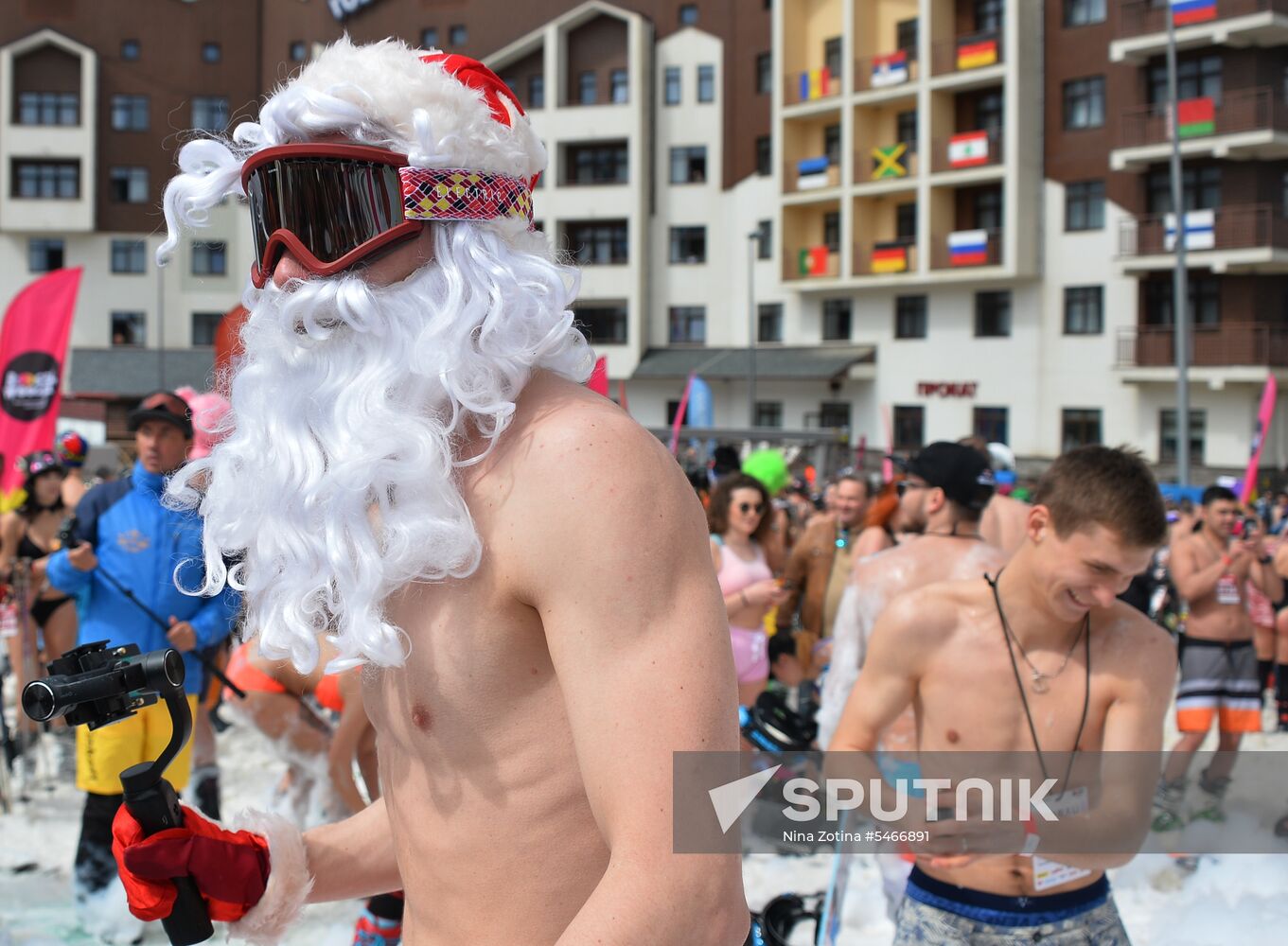 Downhill sliding in bikinis at BoogelWoogel-2018 carnival in Sochi