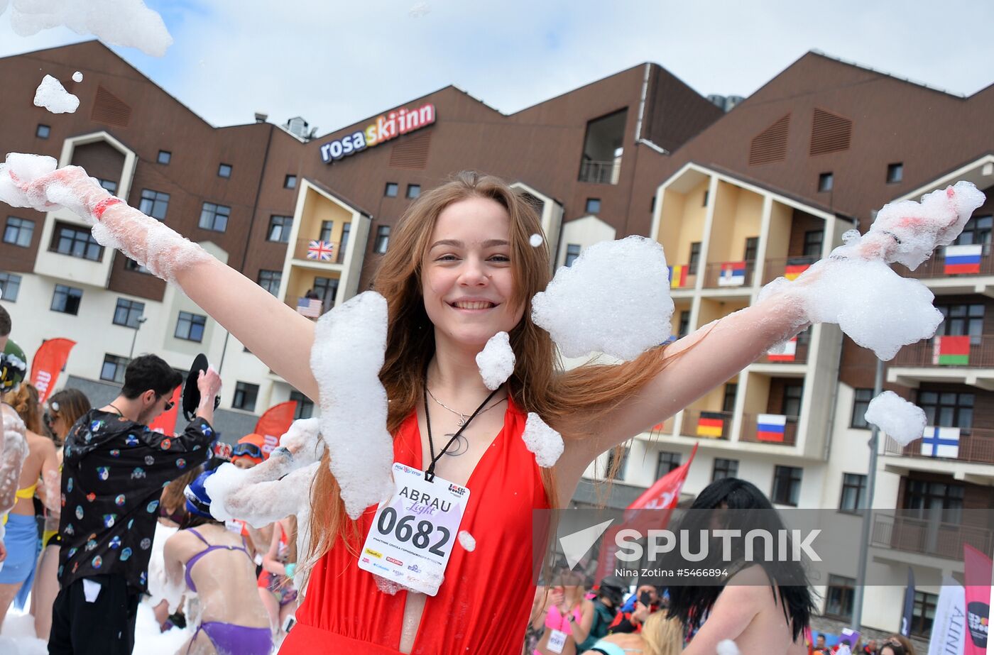 Downhill sliding in bikinis at BoogelWoogel-2018 carnival in Sochi