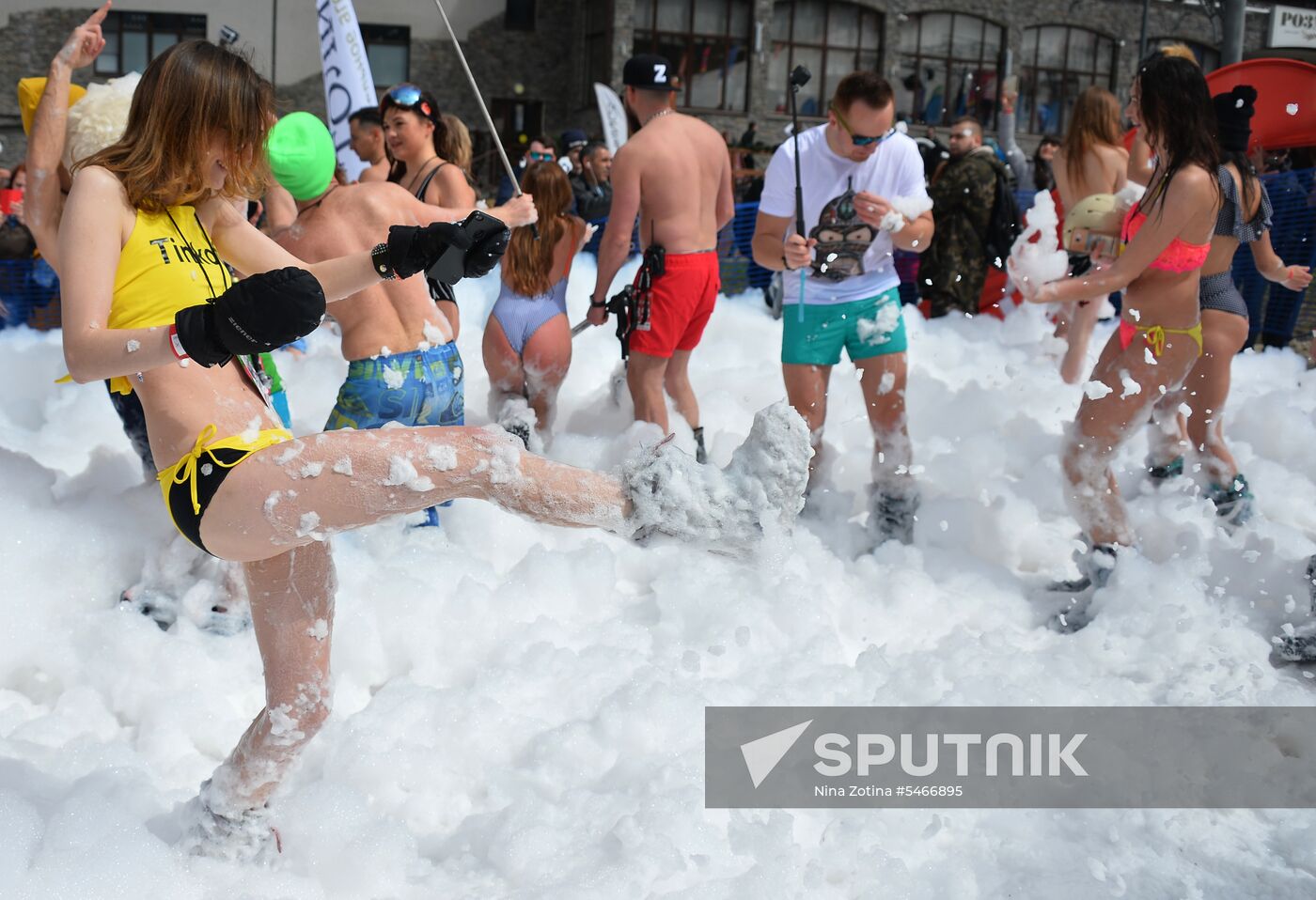 Downhill sliding in bikinis at BoogelWoogel-2018 carnival in Sochi