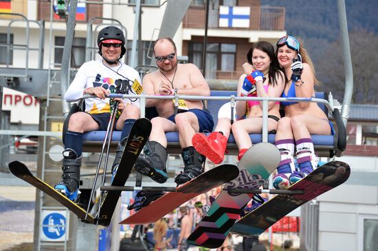 Downhill sliding in bikinis at BoogelWoogel-2018 carnival in Sochi