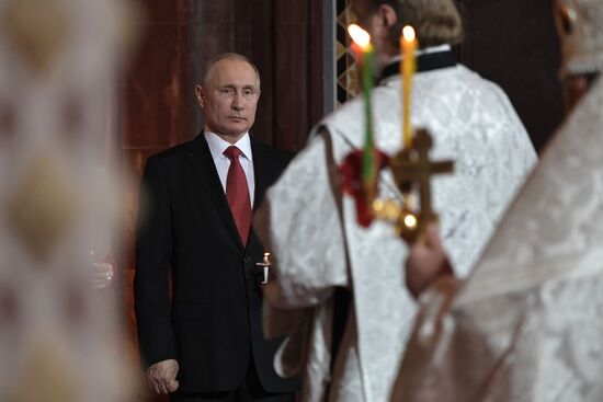 Russian President Vladimir Putin and Russian Prime Minister attend Easter service