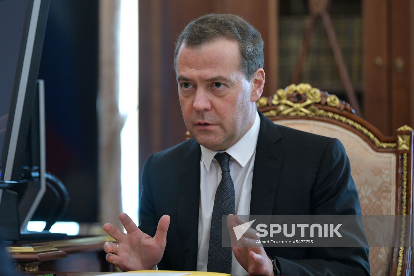 Russian President Vladimir Putin meets with Russian Prime Minister Dmitry Medvedev