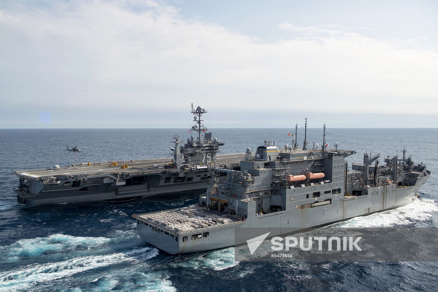 United States Navy strike group led by USS Harry S. Truman leaves port of Norfolk