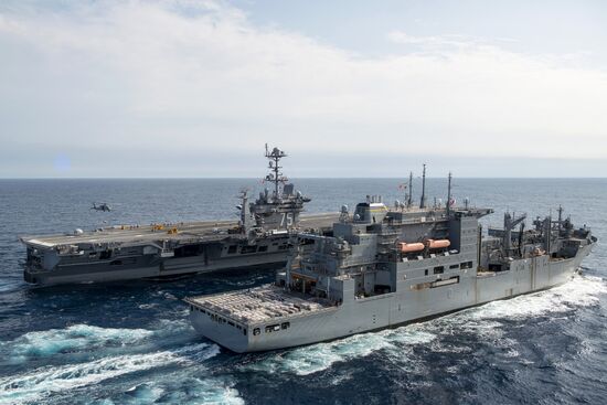 United States Navy strike group led by USS Harry S. Truman leaves port of Norfolk
