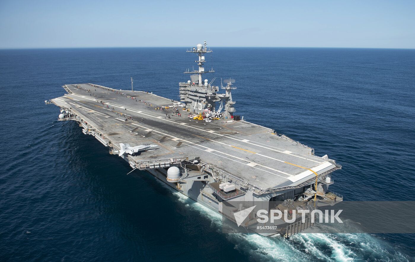 United States Navy strike group led by USS Harry S. Truman leaves port of Norfolk