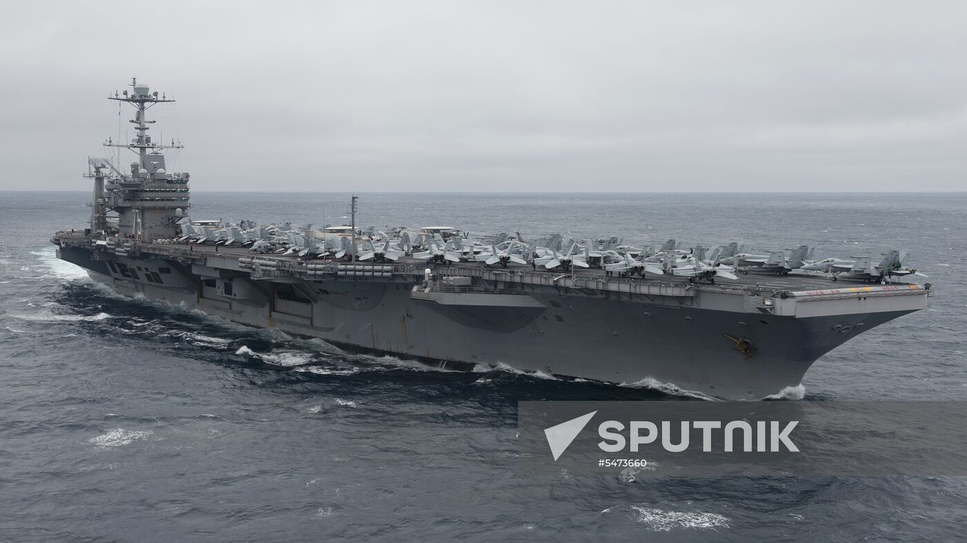 United States Navy strike group led by USS Harry S. Truman leaves port of Norfolk
