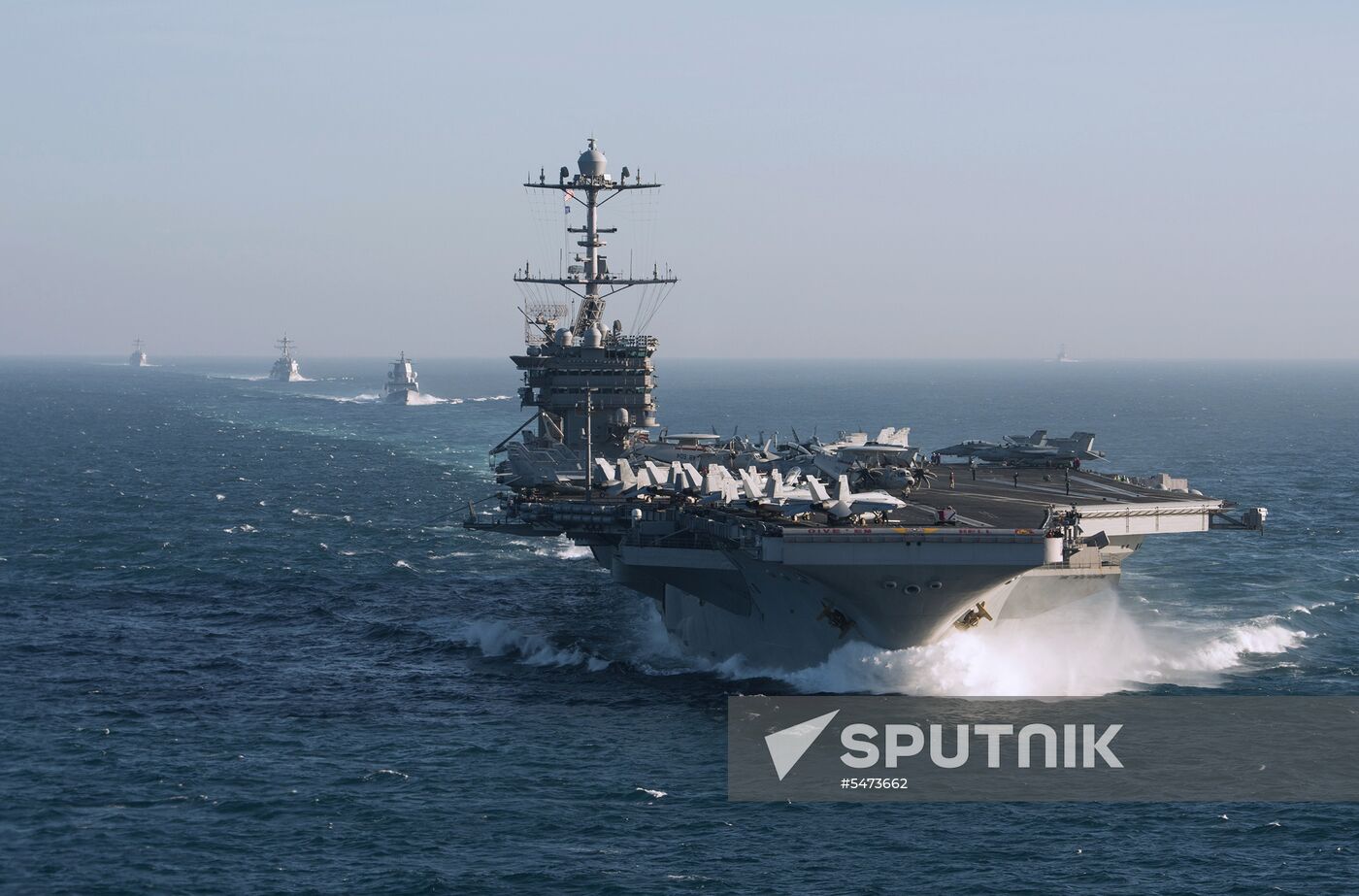 United States Navy strike group led by USS Harry S. Truman leaves port of Norfolk