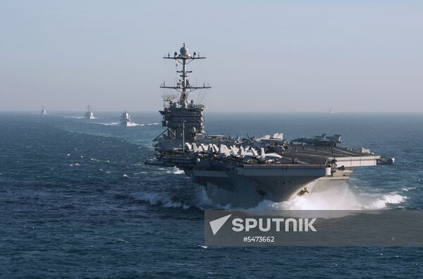 United States Navy strike group led by USS Harry S. Truman leaves port of Norfolk