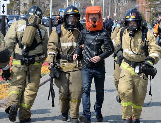 Evacuation tactics and simulated firefighting drill in Yuzhny Park shopping mall in Khabarovsk