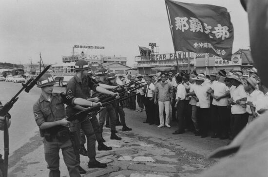 Picket of Japanese strikers at American military post