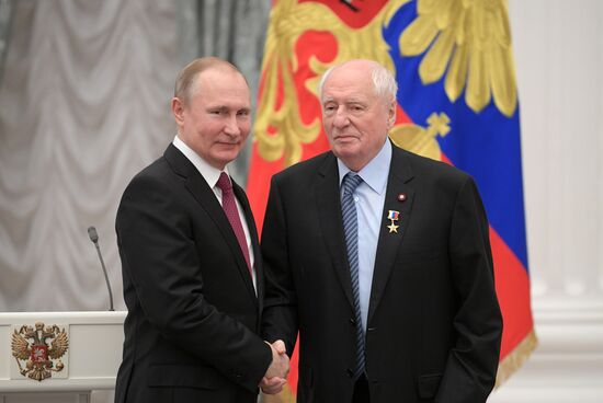 Russian President Vladimir Putin presents Hero of Labor of Russian Federation medals