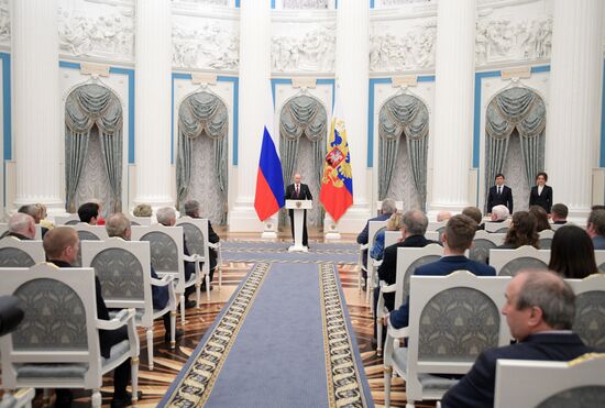 Russian President Vladimir Putin presents Hero of Labor of Russian Federation medals