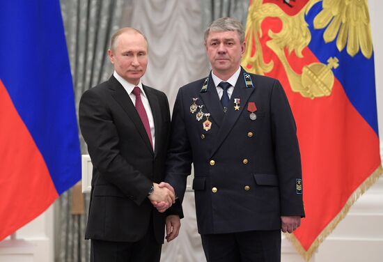 Russian President Vladimir Putin presents Hero of Labor of Russian Federation medals