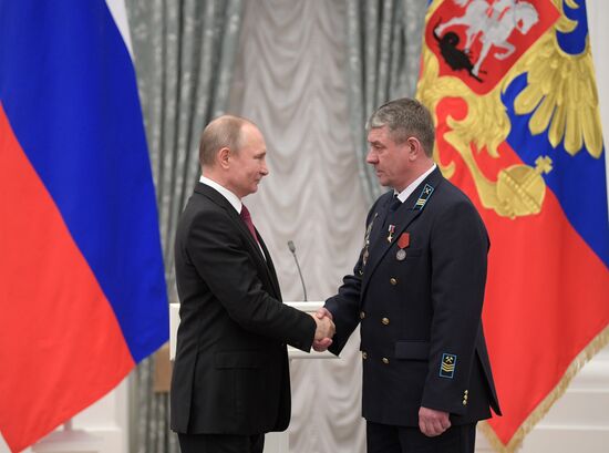 Russian President Vladimir Putin presents Hero of Labor of Russian Federation medals