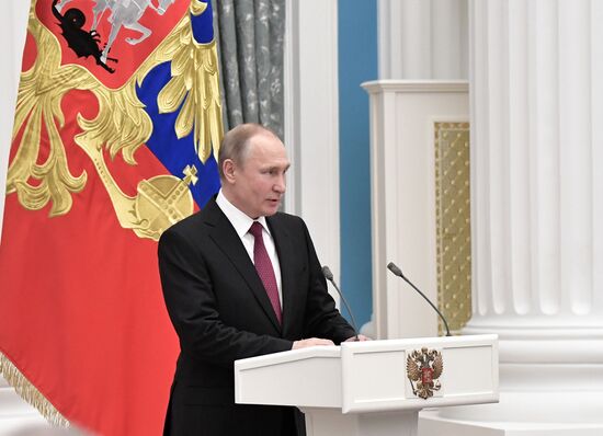 Russian President Vladimir Putin presents Hero of Labor of Russian Federation medals